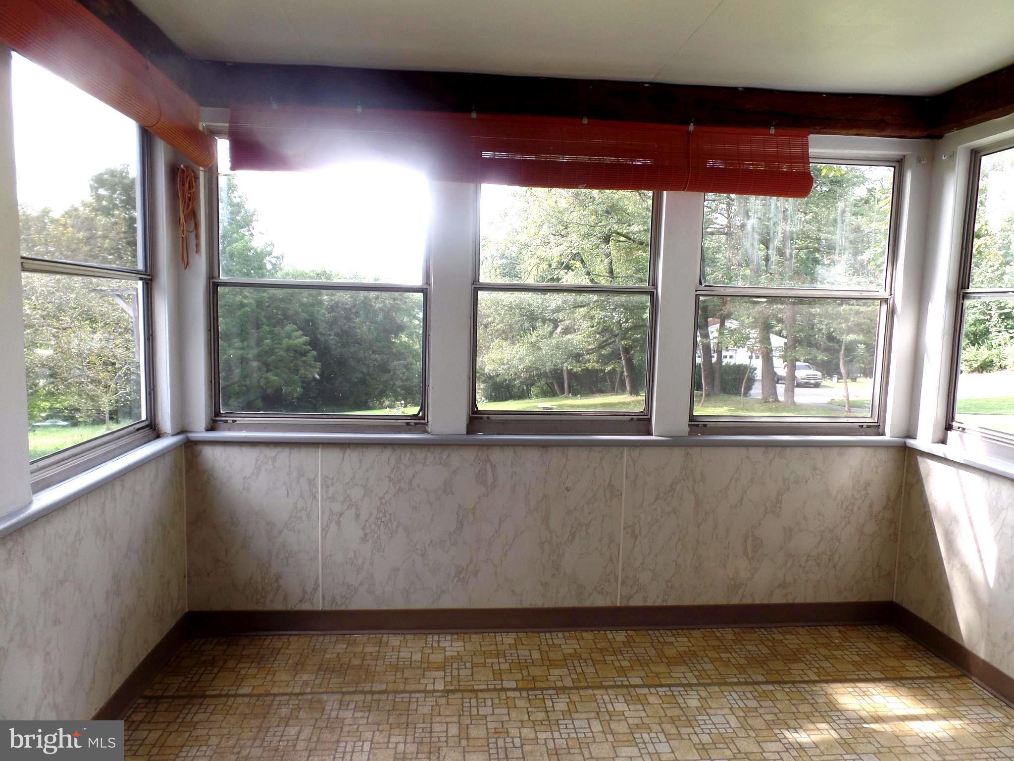 1636 Exeter Road Westminster, MD 21157 - Photo 8 of 23 a view of an empty room with a window