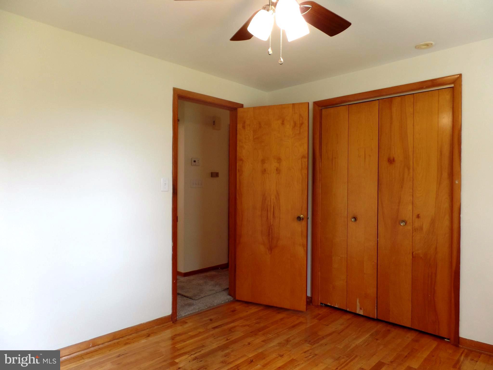 1636 Exeter Road Westminster, MD 21157 - Photo 10 of 23 a view of a livingroom with wooden floor