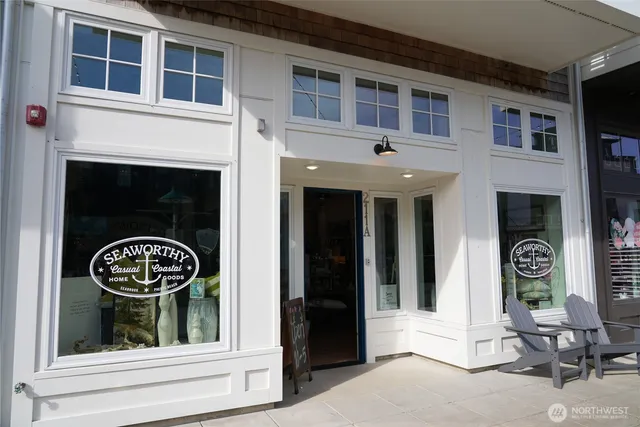 an aerial view of a house with a ocean view