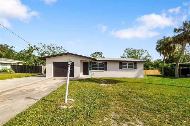 a house view with a garden space