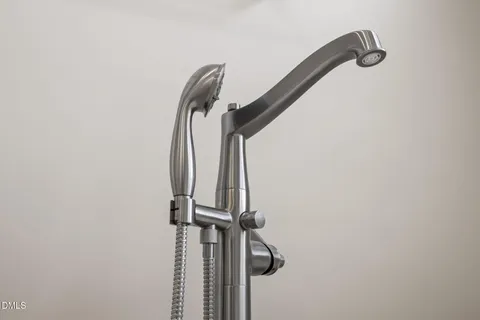 a utility room with closet dryer and washer