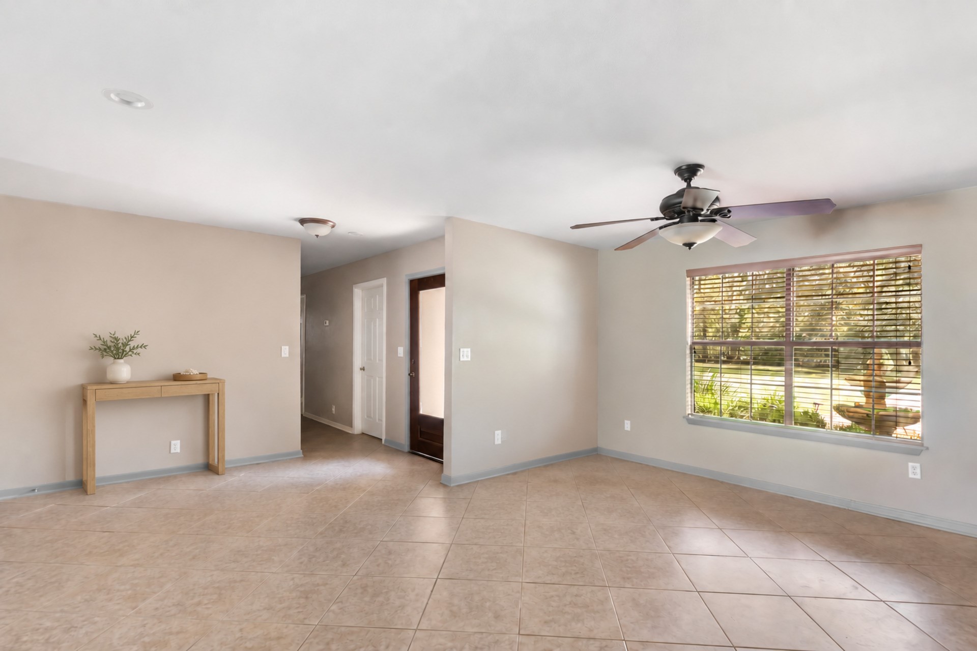 1300 Smith Road Huffman, TX 77336 - Photo 26 of 50 Bright and welcoming entryway leading into a spacious dining/ kitchen area. -Virtually staged photo, see next.