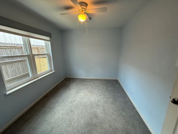 a view of a livingroom with a window