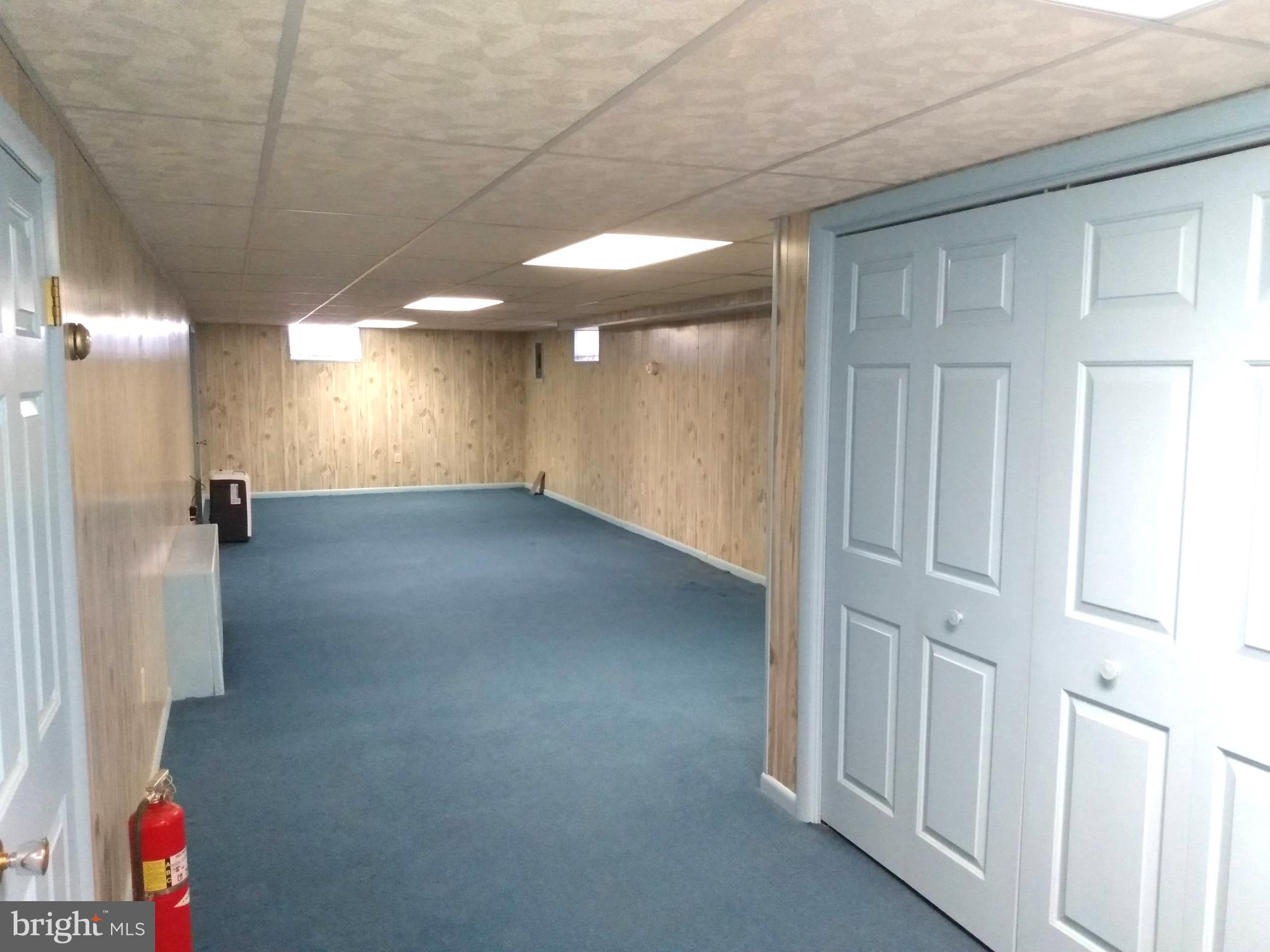 228 Mill Road Chambersburg, PA 17201 - Photo 20 of 32 Lower-Level Family Room