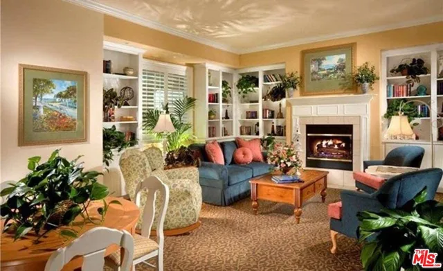 a view of a chairs and table in a patio