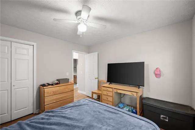 a room with furniture and flat screen tv