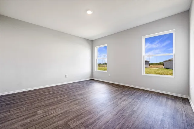 a view of an empty room and window