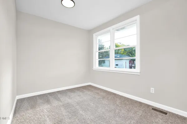 an empty room with a window