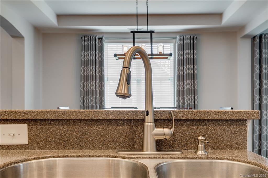 6743 Dusty Saddle Road Charlotte, NC 28277 - Photo 12 of 47 a close view of sink and mirror