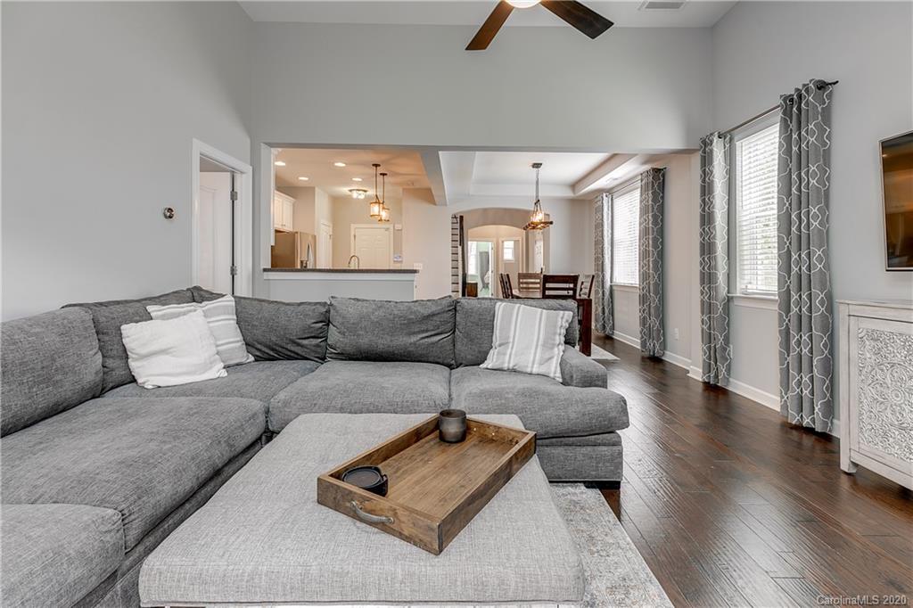 6743 Dusty Saddle Road Charlotte, NC 28277 - Photo 15 of 47 a living room with furniture and a large window