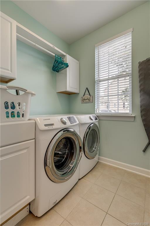 6743 Dusty Saddle Road Charlotte, NC 28277 - Photo 25 of 47 a utility room with sink dryer and washer