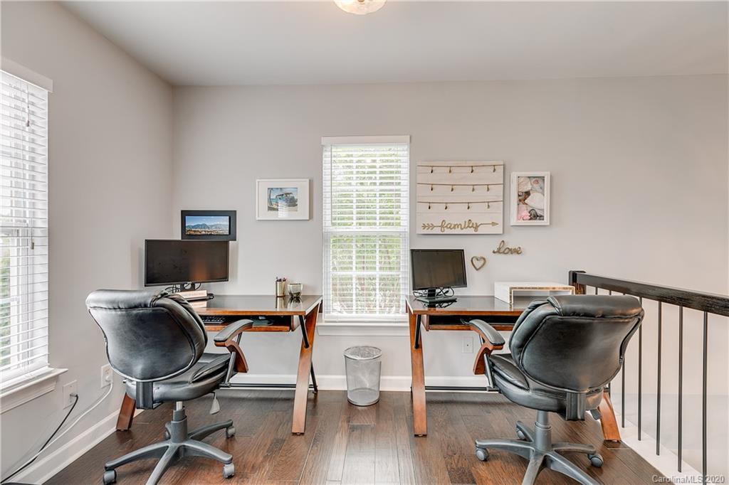 6743 Dusty Saddle Road Charlotte, NC 28277 - Photo 28 of 47 a view of a workspace with furniture and a window