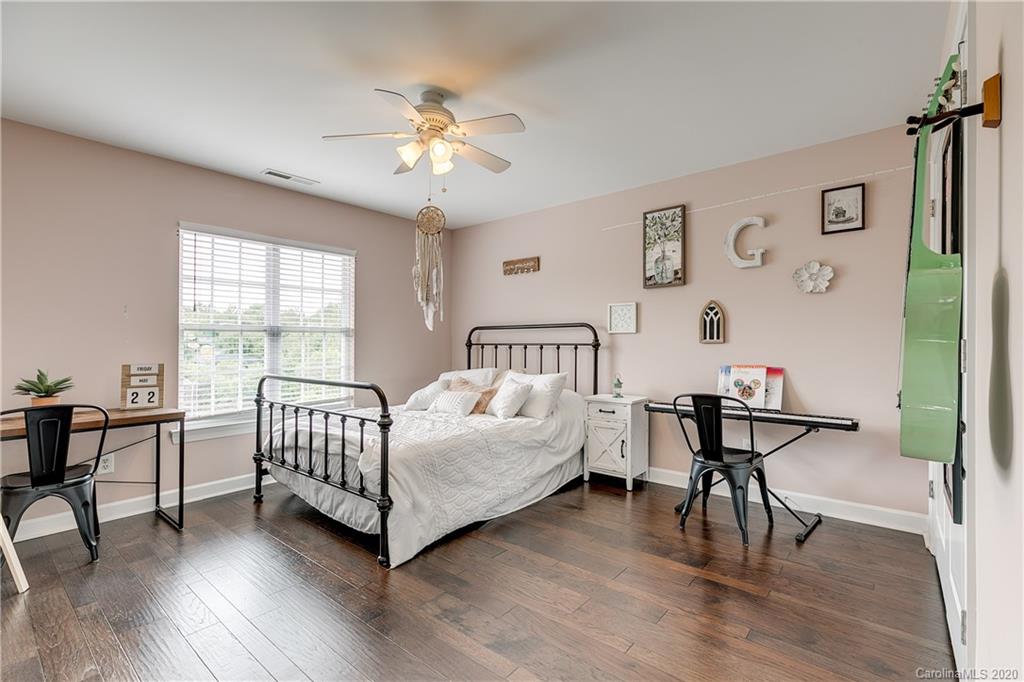 6743 Dusty Saddle Road Charlotte, NC 28277 - Photo 34 of 47 a living room with furniture and wooden floor