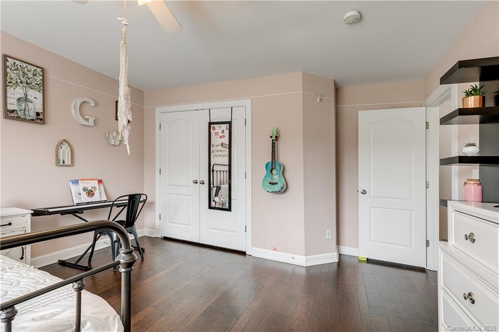 6743 Dusty Saddle Road Charlotte, NC 28277 - Photo 35 of 47 a view of kitchen and dining room with furniture wooden floor and window