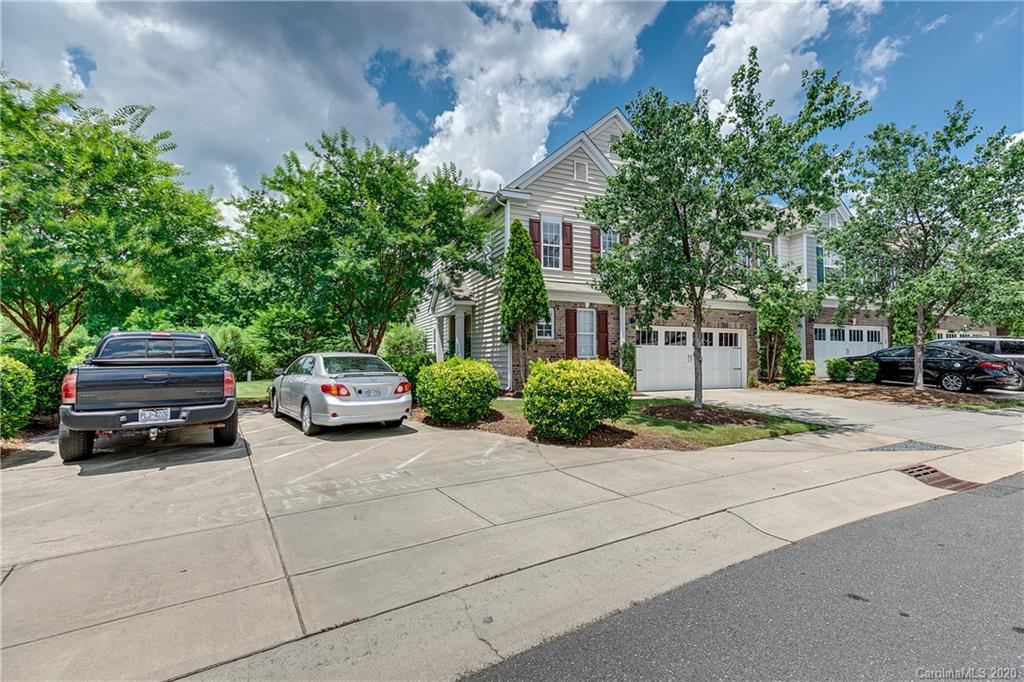 6743 Dusty Saddle Road Charlotte, NC 28277 - Photo 47 of 47 a view of a car parked in front of a brick house