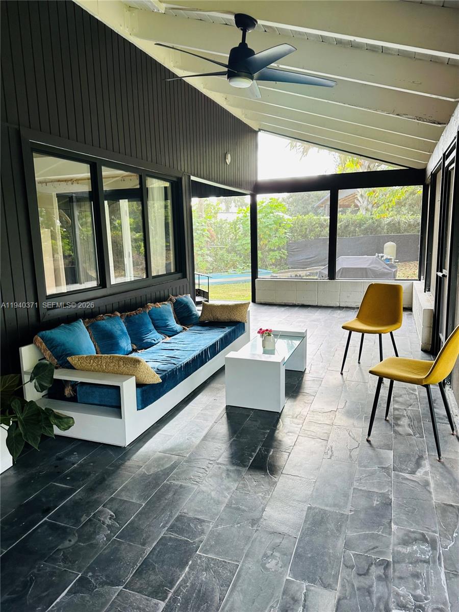 16470 Southwest 234th Street Homestead, FL 33031 - Photo 16 of 21 a building outdoor space with patio furniture and a potted plant