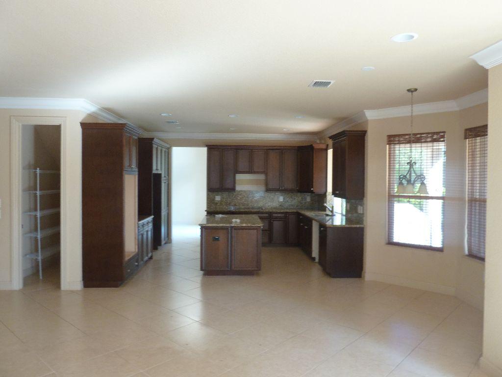 11037 Misty Ridge Way Boynton Beach, FL 33473 - Photo 4 of 14 Large Kitchen with Granite Countertops