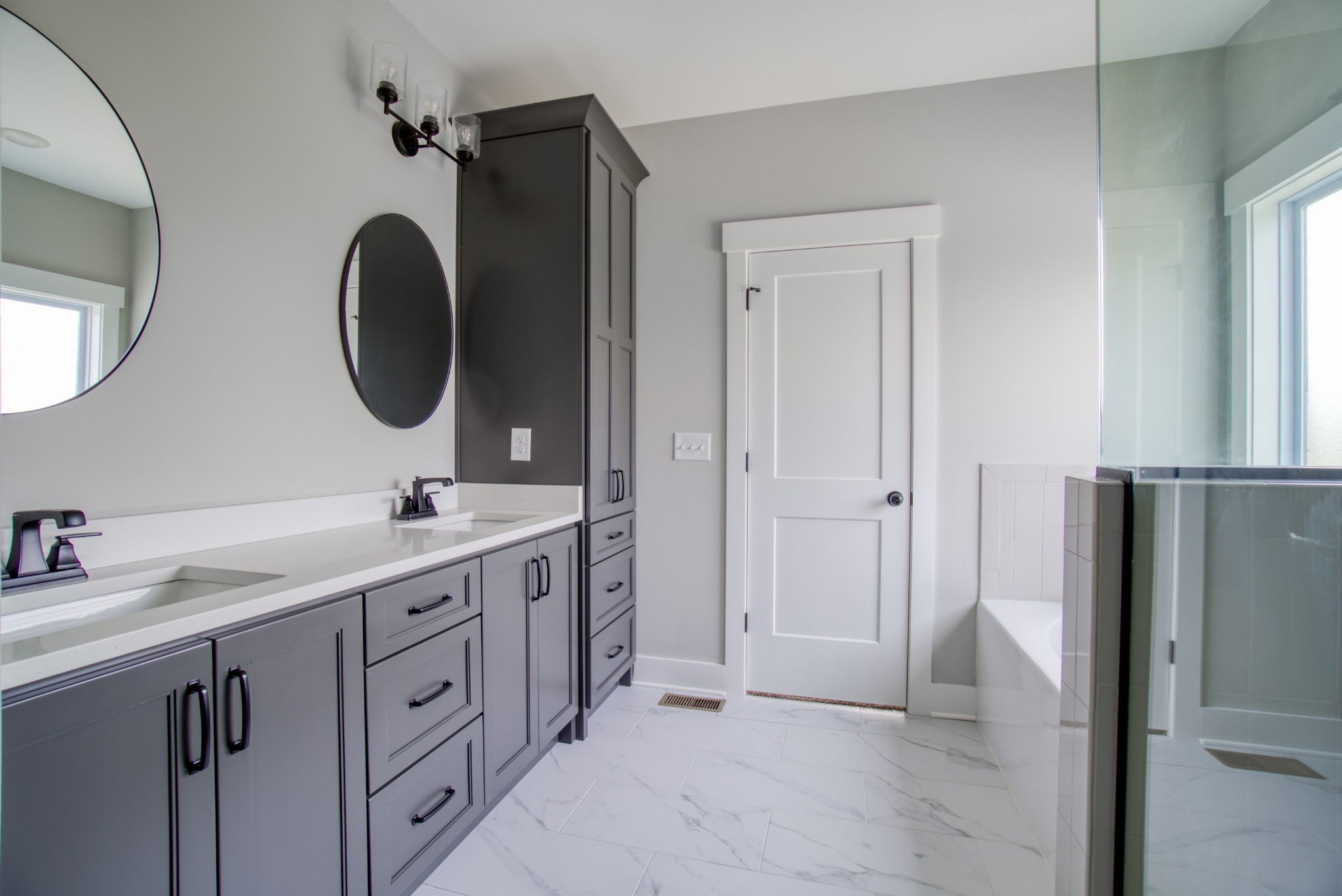 5691 Minnis Road Springfield, TN 37172 - Photo 11 of 19 a bathroom with a double vanity sink and a mirror