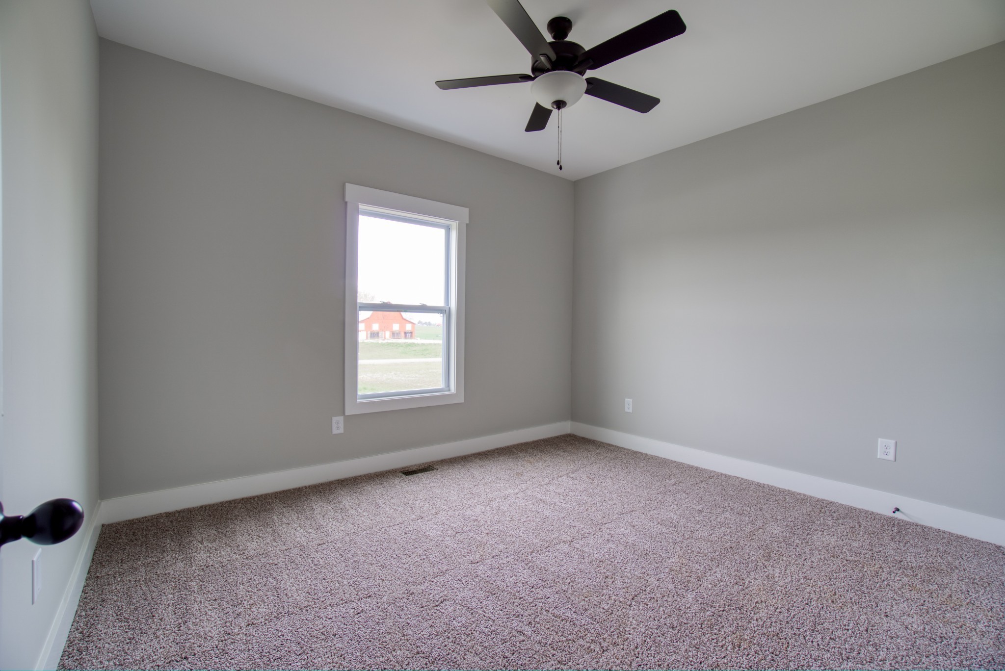5691 Minnis Road Springfield, TN 37172 - Photo 14 of 19 an empty room with a window and a fan