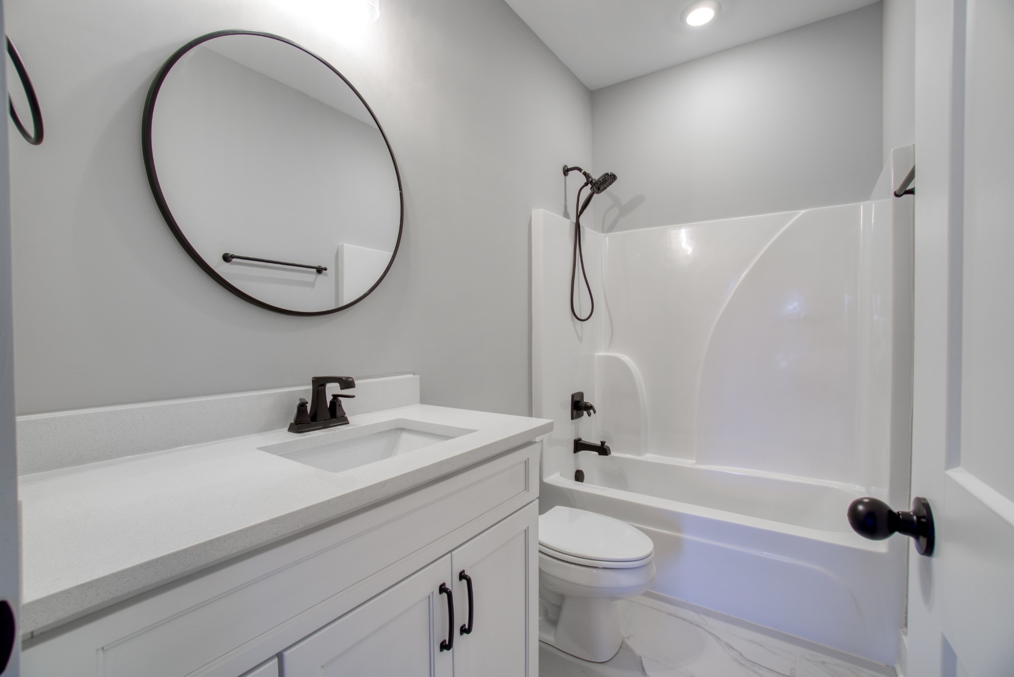 5691 Minnis Road Springfield, TN 37172 - Photo 16 of 19 a bathroom with a sink a toilet and a mirror