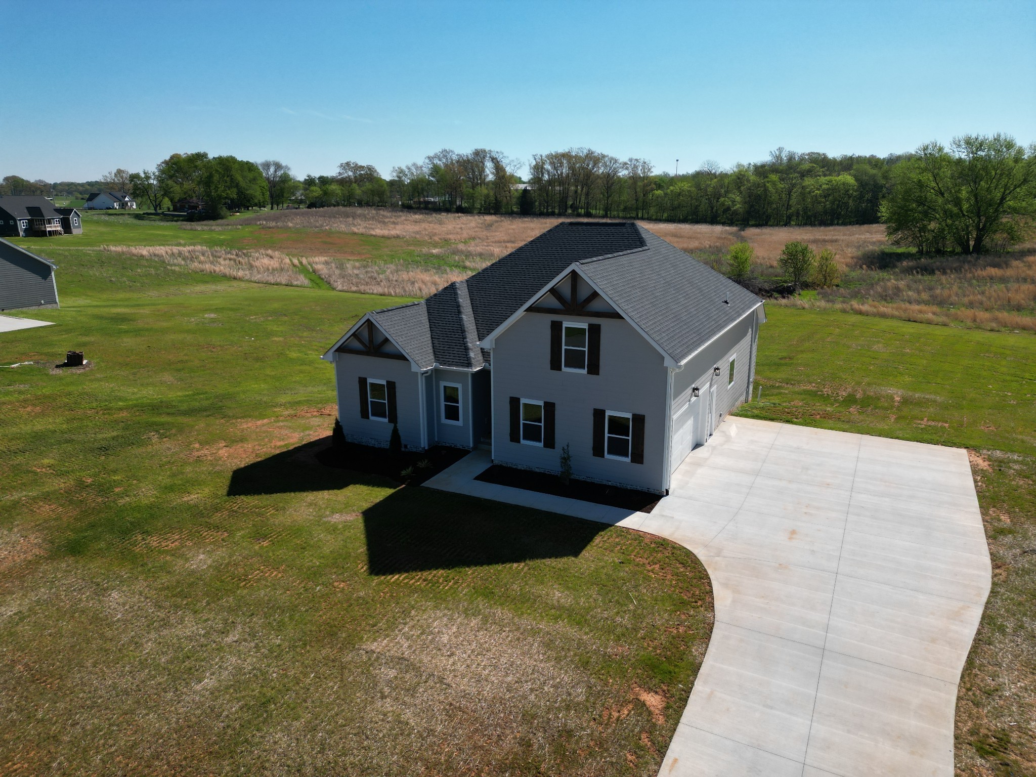 5691 Minnis Road Springfield, TN 37172 - Photo 3 of 19 a view of a house with a yard and a large tree