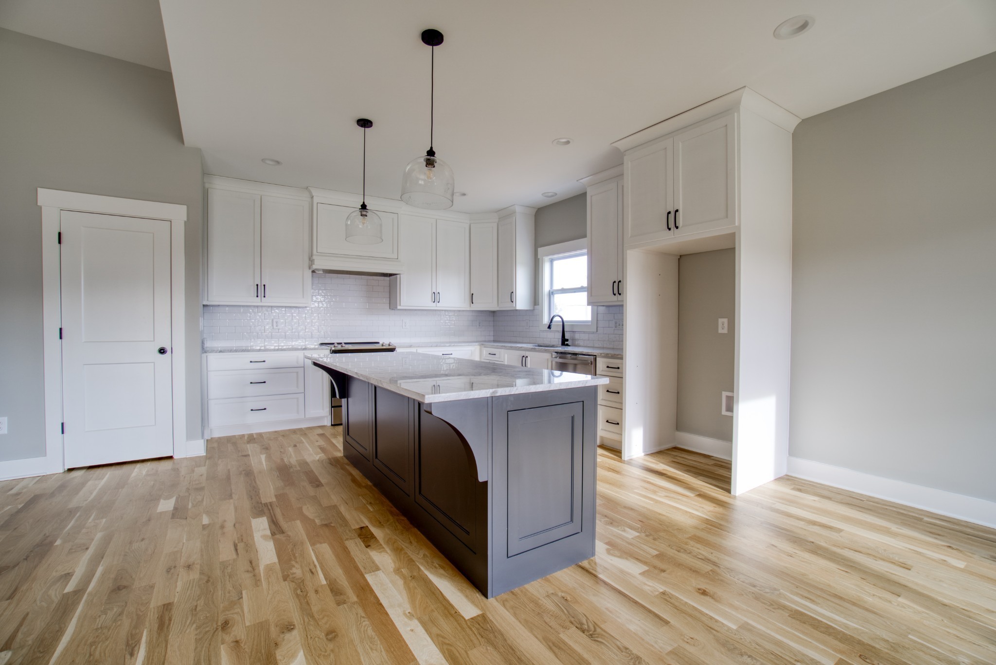 5691 Minnis Road Springfield, TN 37172 - Photo 6 of 19 a kitchen with stainless steel appliances granite countertop a sink stove and a refrigerator