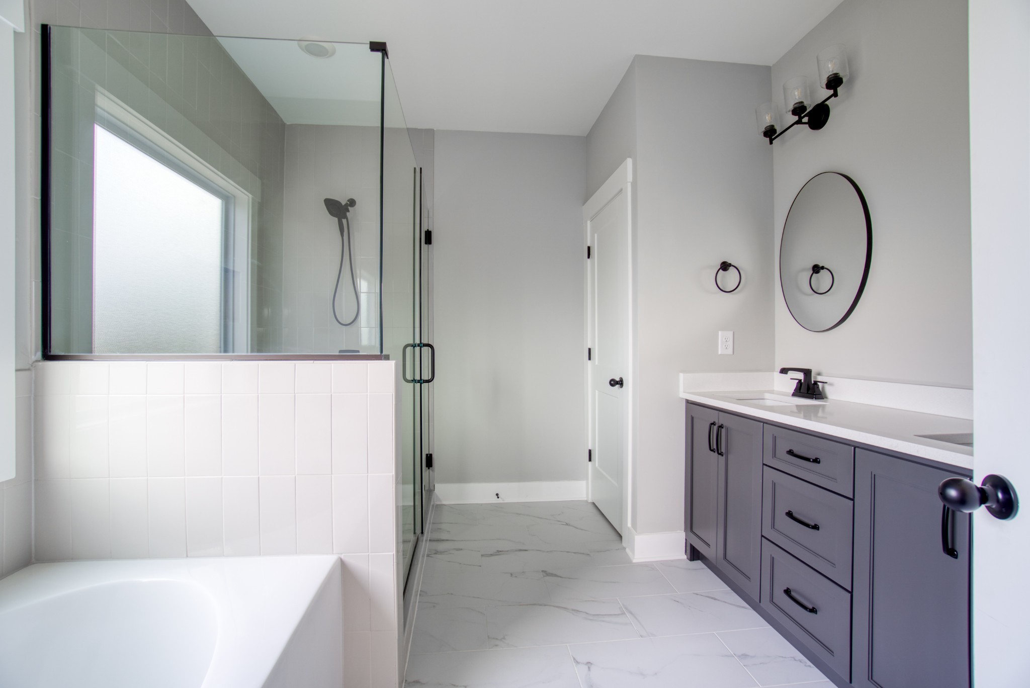 5691 Minnis Road Springfield, TN 37172 - Photo 10 of 19 a bathroom with a tub sink and mirror