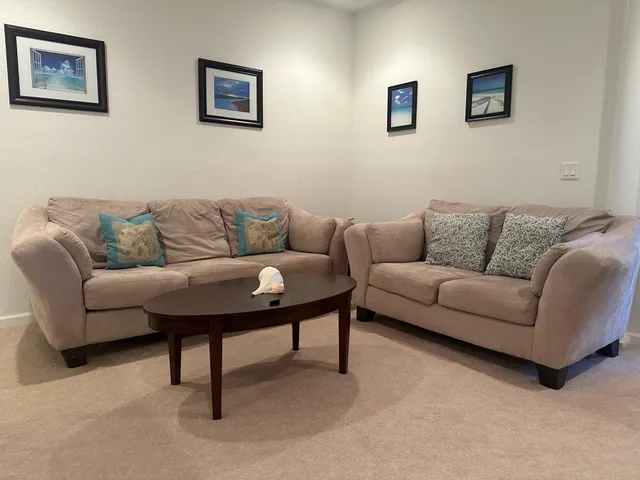 a living room with furniture and a couch
