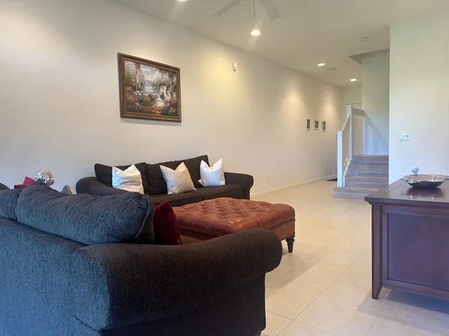 a living room with furniture and a couch