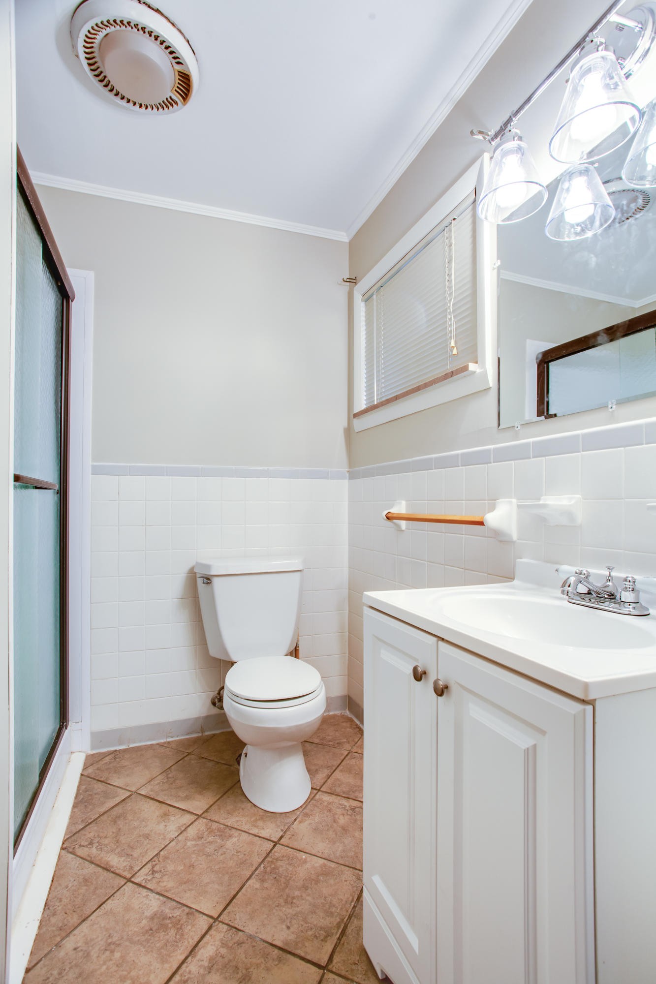 100 Culver Road Oak Ridge, TN 37830 - Photo 13 of 22 a bathroom with a sink toilet and vanity
