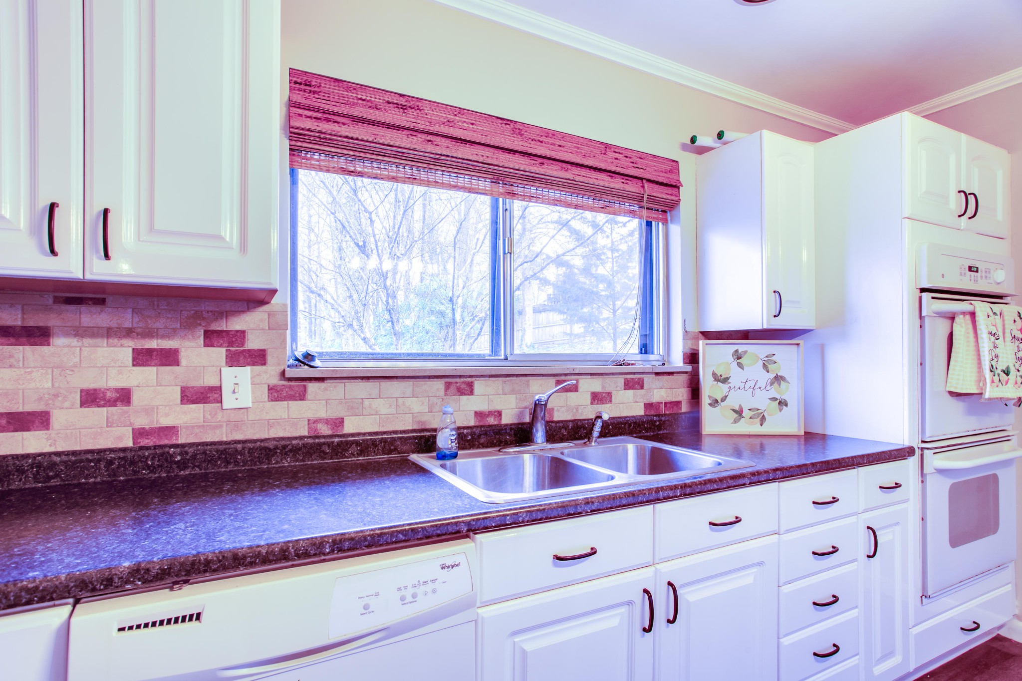 100 Culver Road Oak Ridge, TN 37830 - Photo 8 of 22 a kitchen with granite countertop a sink and a window