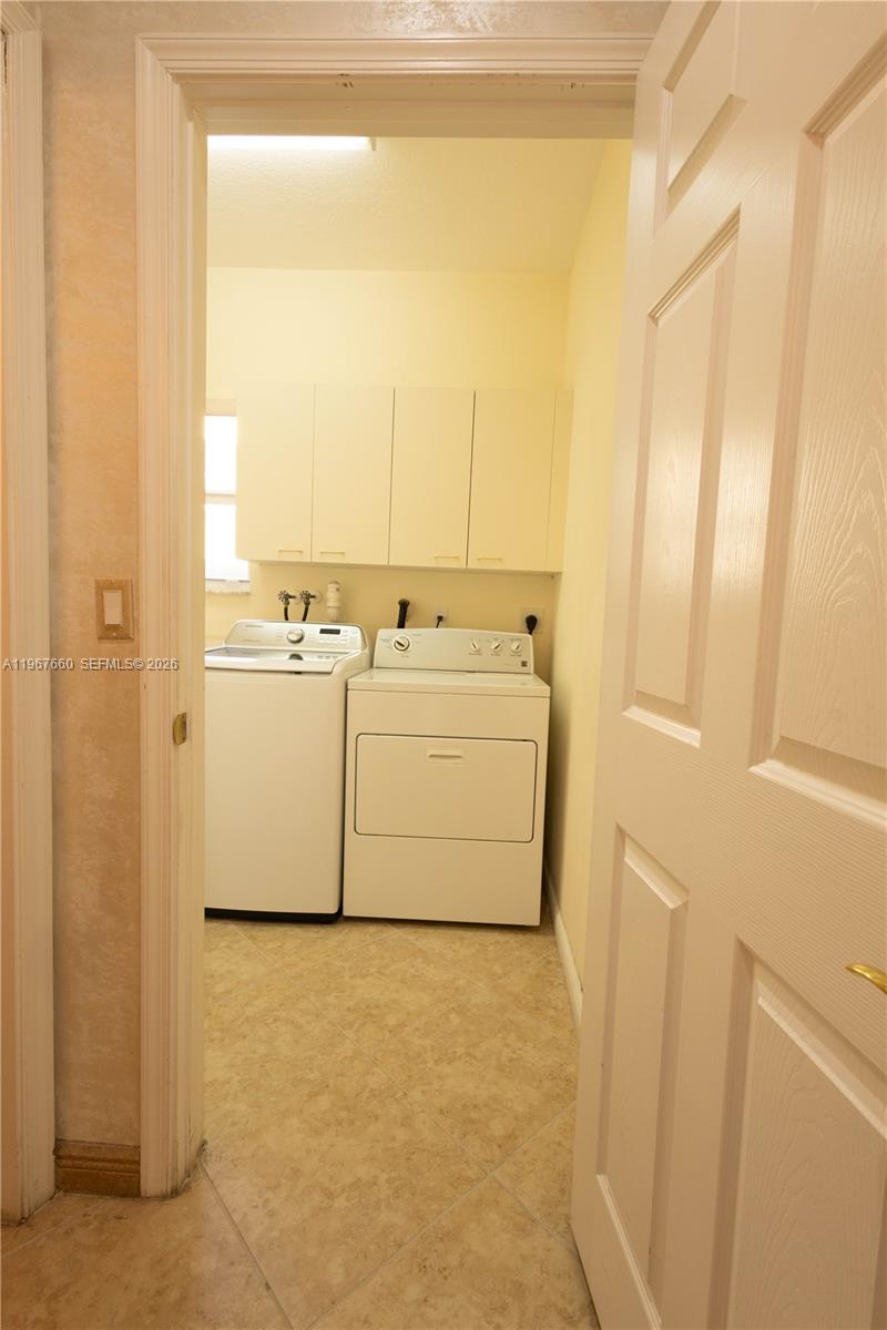 5331 Southwest 159th Avenue, Unit 5331 Miramar, FL 33027 - Photo 13 of 41 a utility room with dryer and washer