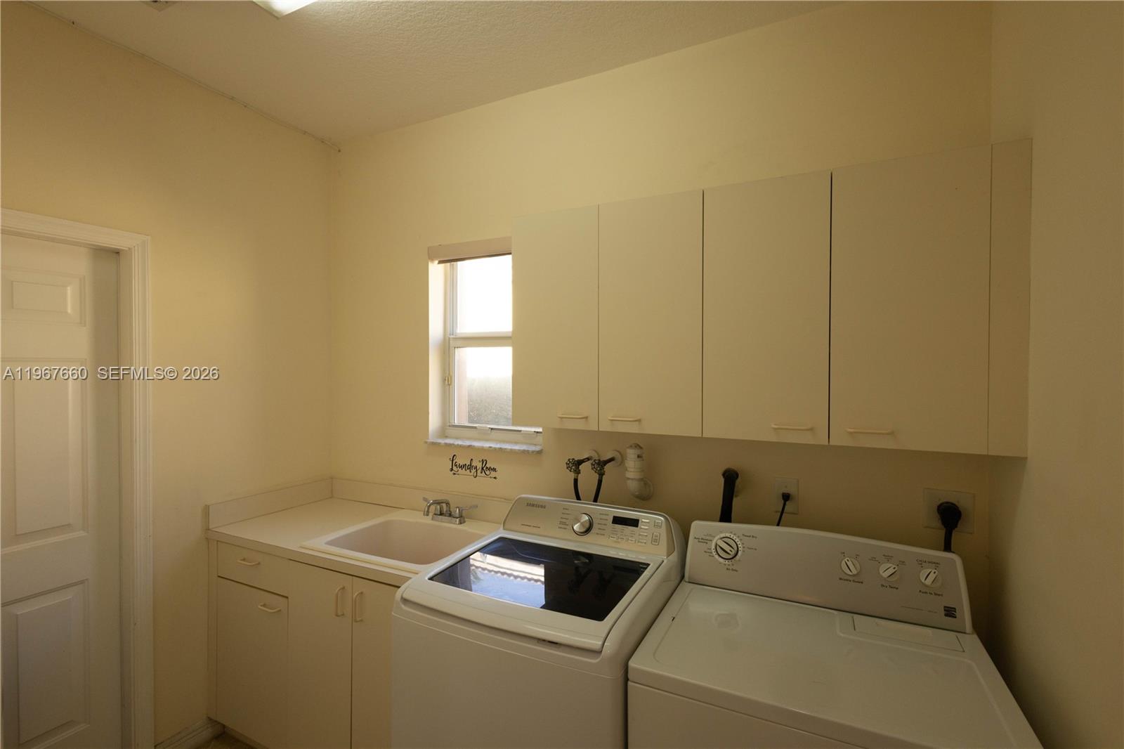 5331 Southwest 159th Avenue, Unit 5331 Miramar, FL 33027 - Photo 14 of 41 a utility room with dryer and washer