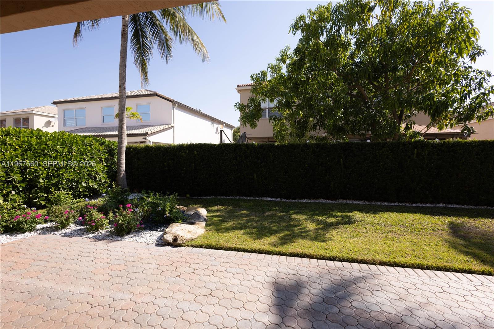 5331 Southwest 159th Avenue, Unit 5331 Miramar, FL 33027 - Photo 15 of 41 a view of a back yard