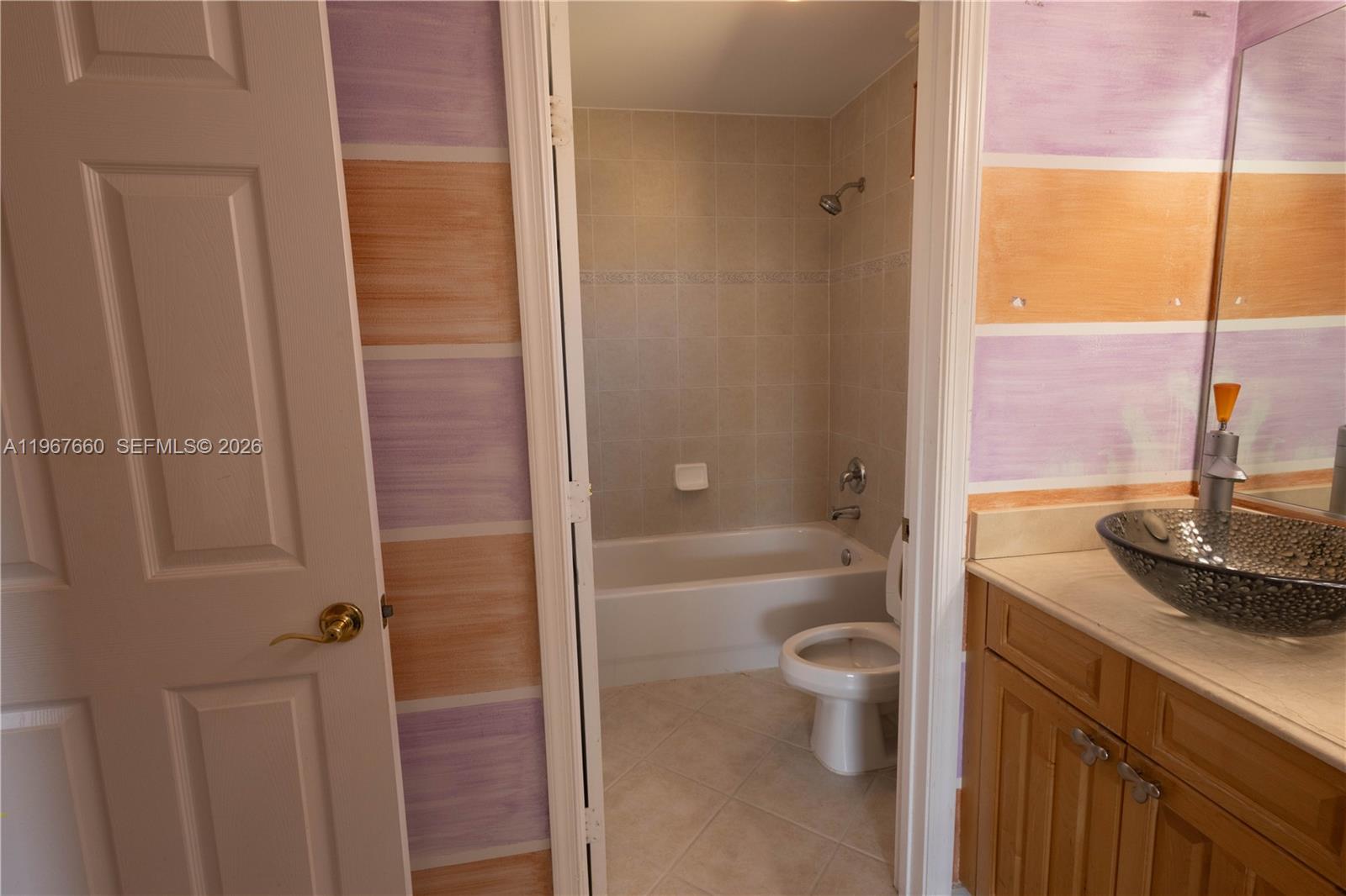 5331 Southwest 159th Avenue, Unit 5331 Miramar, FL 33027 - Photo 21 of 41 a bathroom with a granite countertop sink a toilet and shower