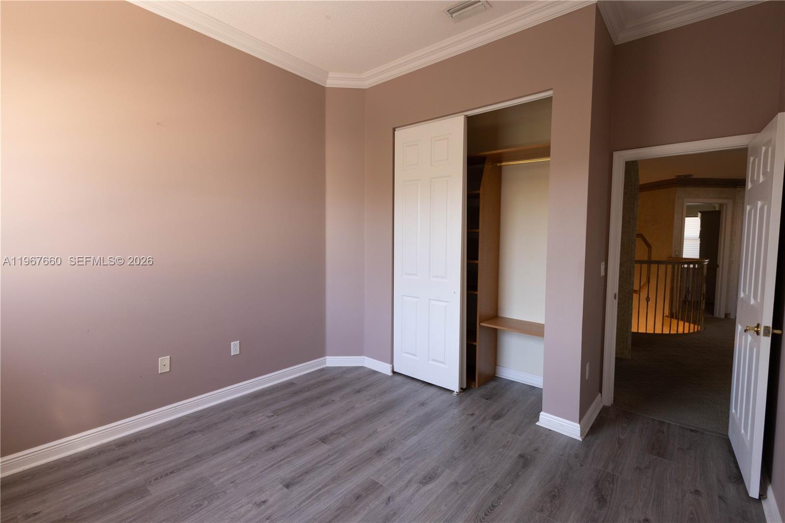 5331 Southwest 159th Avenue, Unit 5331 Miramar, FL 33027 - Photo 24 of 41 wooden floor in an empty room