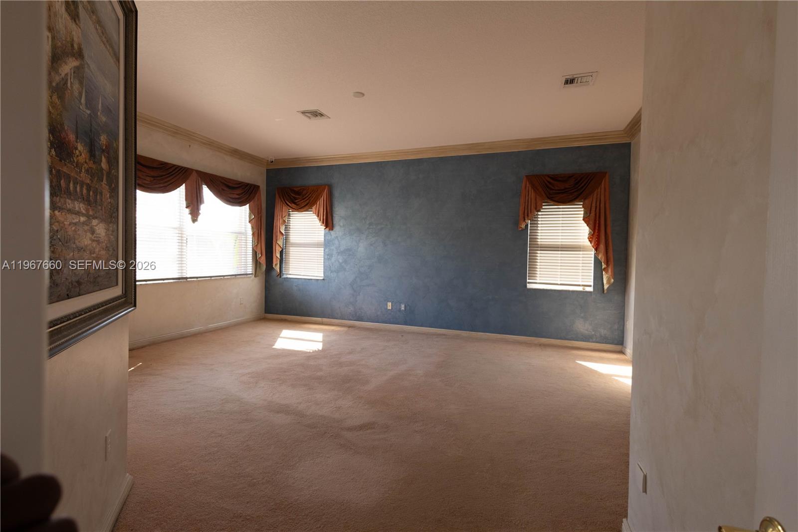 5331 Southwest 159th Avenue, Unit 5331 Miramar, FL 33027 - Photo 27 of 41 an empty room with windows