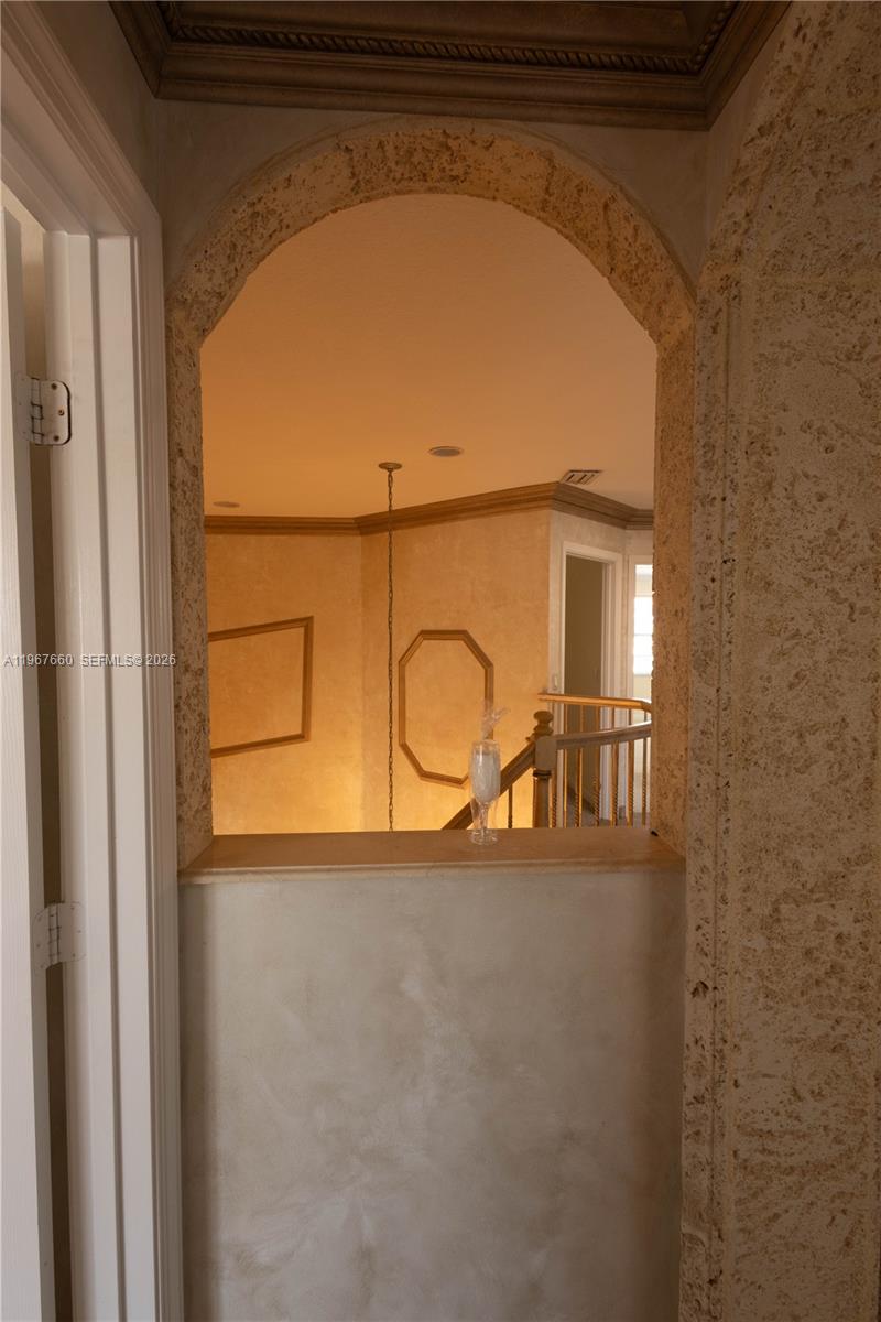 5331 Southwest 159th Avenue, Unit 5331 Miramar, FL 33027 - Photo 38 of 41 a view of a room with rack on the wall and shower