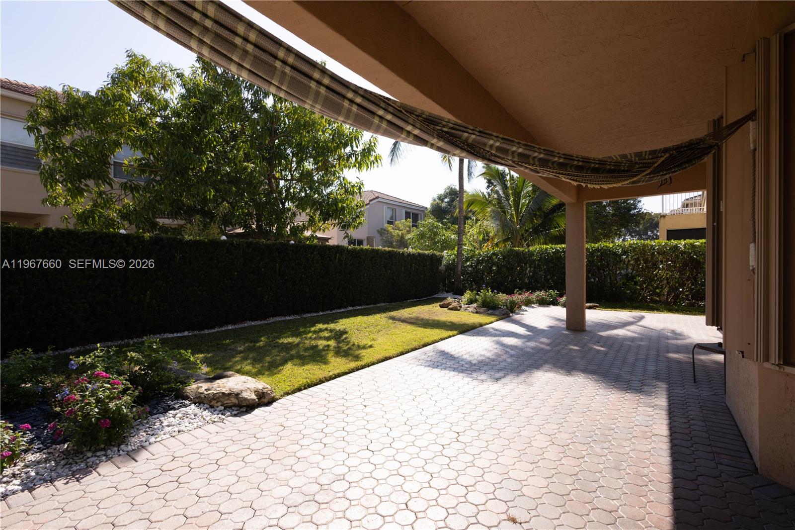 5331 Southwest 159th Avenue, Unit 5331 Miramar, FL 33027 - Photo 39 of 41 a view of swimming pool with a patio