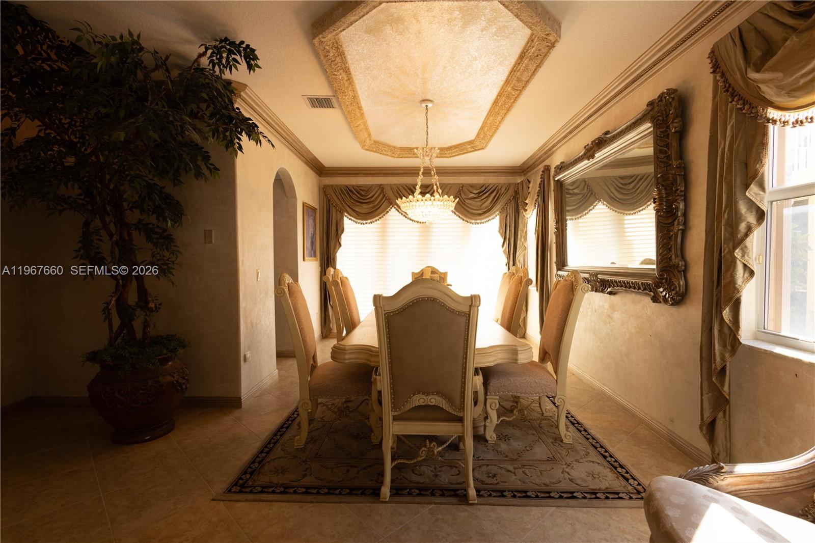5331 Southwest 159th Avenue, Unit 5331 Miramar, FL 33027 - Photo 7 of 41 a view of a porch with a table and chairs