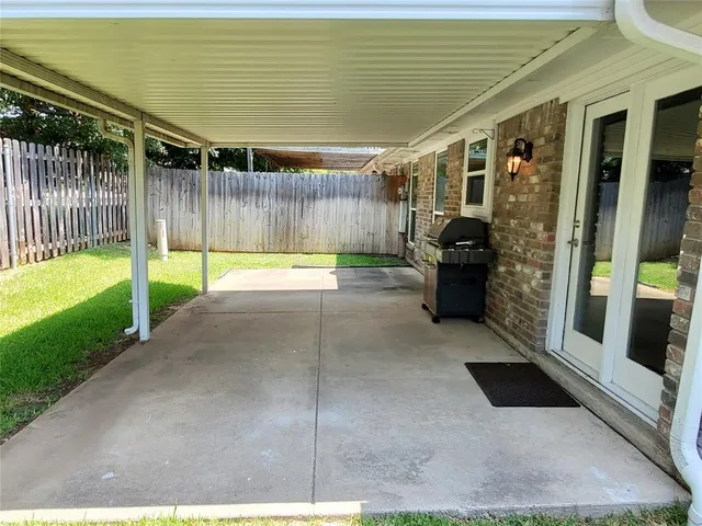 a view of outdoor space and barbecue grill