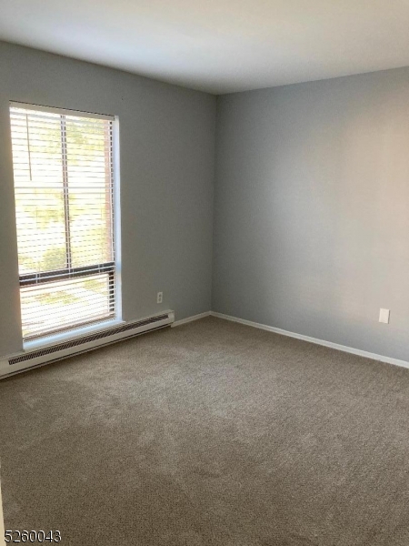595 Auten Road, Unit 7 Hillsborough, NJ 08844 - Photo 12 of 15 an empty room with a window