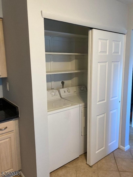 595 Auten Road, Unit 7 Hillsborough, NJ 08844 - Photo 4 of 15 a utility room with washing machine