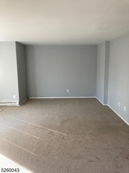595 Auten Road, Unit 7 Hillsborough, NJ 08844 - Photo 7 of 15 a view of an empty room