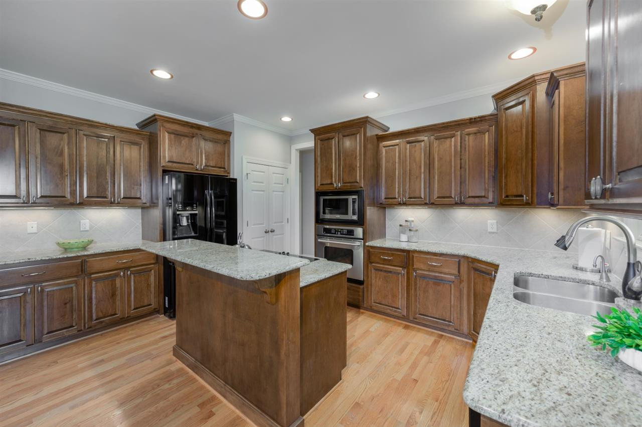 2116 Conroy Way Willow Spring, NC 27592 - Photo 5 of 26 Kitchen with center island