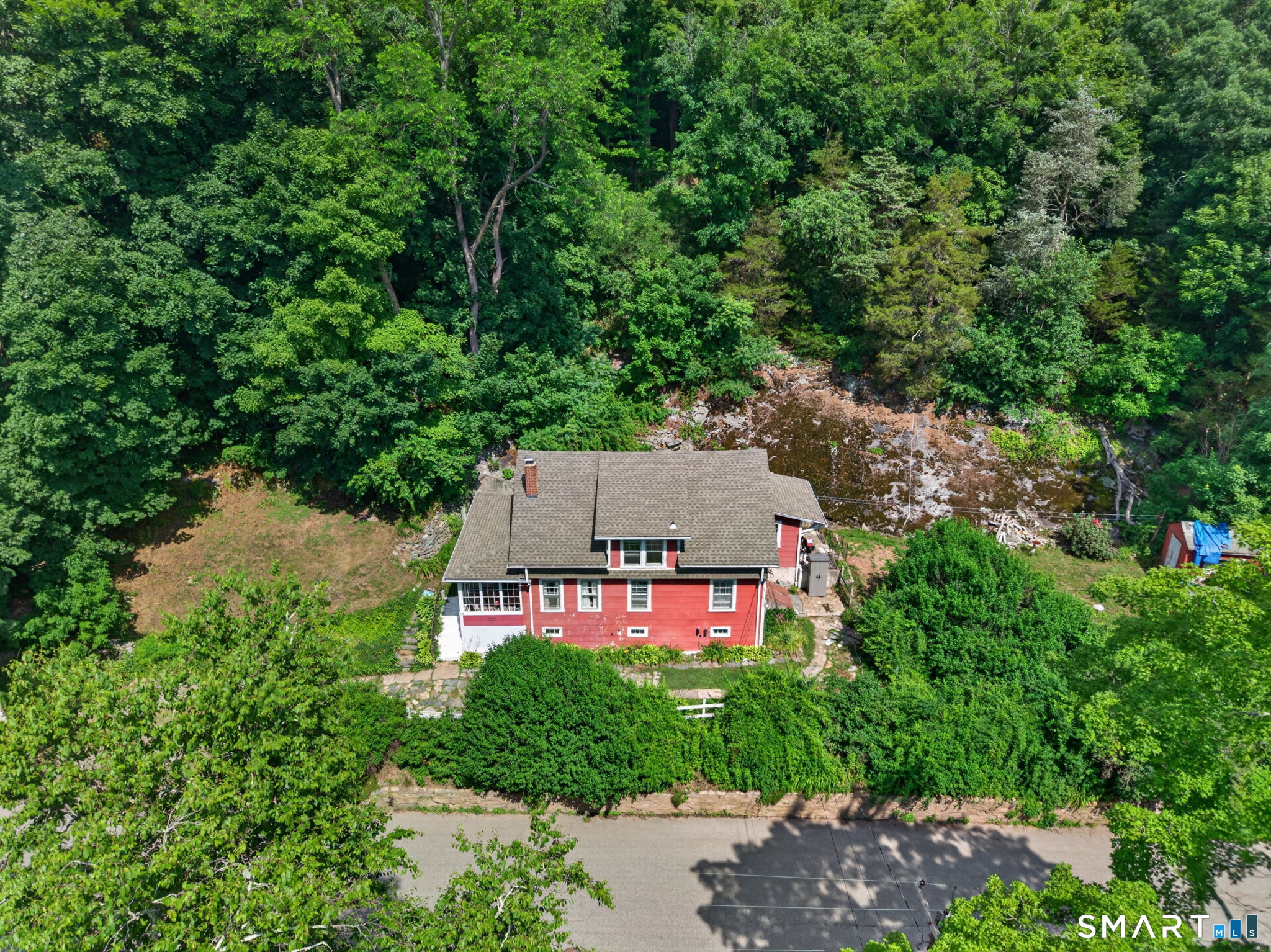 79 River Street Deep River, CT 06417 - Photo 3 of 40 an aerial view of a house with yard and green space