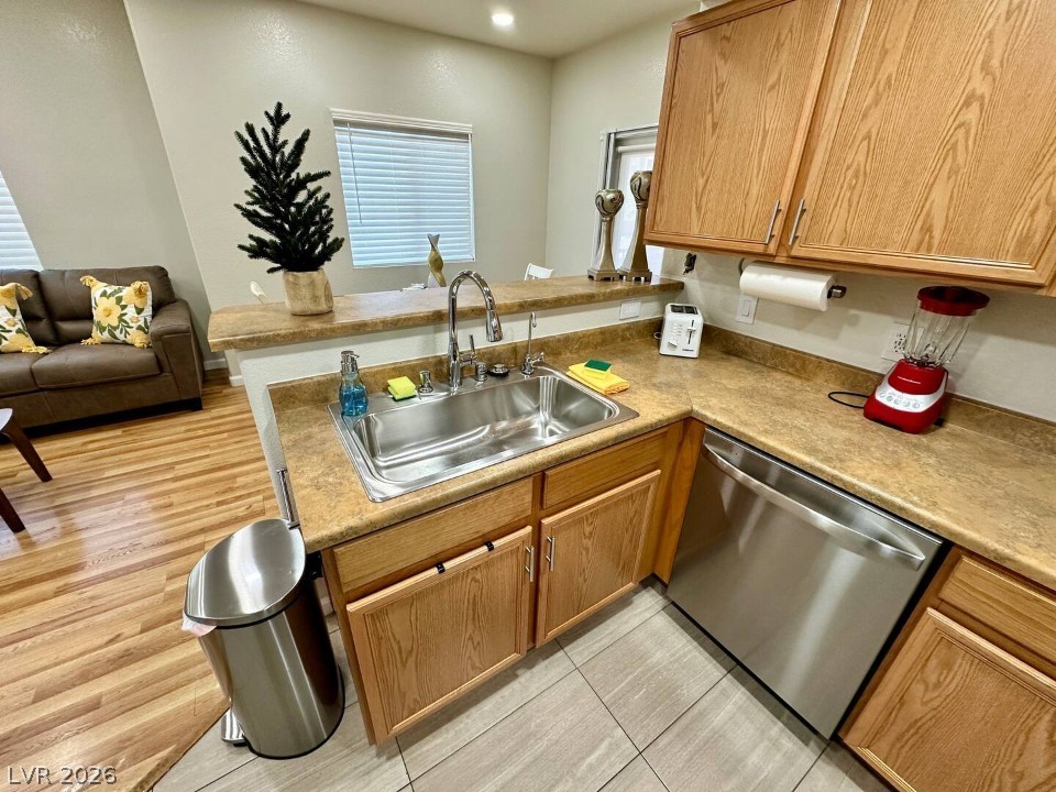 9580 West Reno Avenue, Unit 169 Las Vegas, NV 89148 - Photo 6 of 15 A well-appointed kitchen features ample counter space and sleek stainless steel appliances.