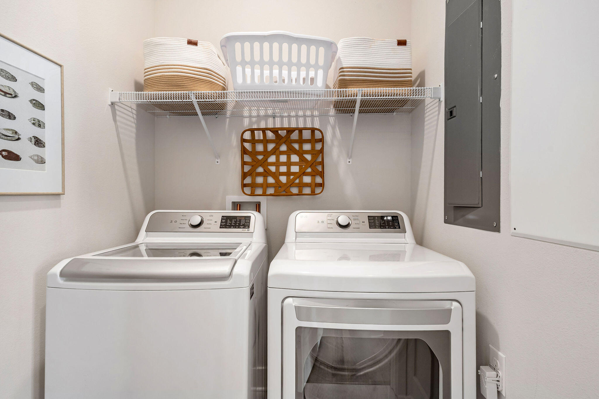 296 Milestone Dr Inlet Beach, Unit C Inlet Beach, FL 32461 - Photo 17 of 51 a utility room with dryer and washer
