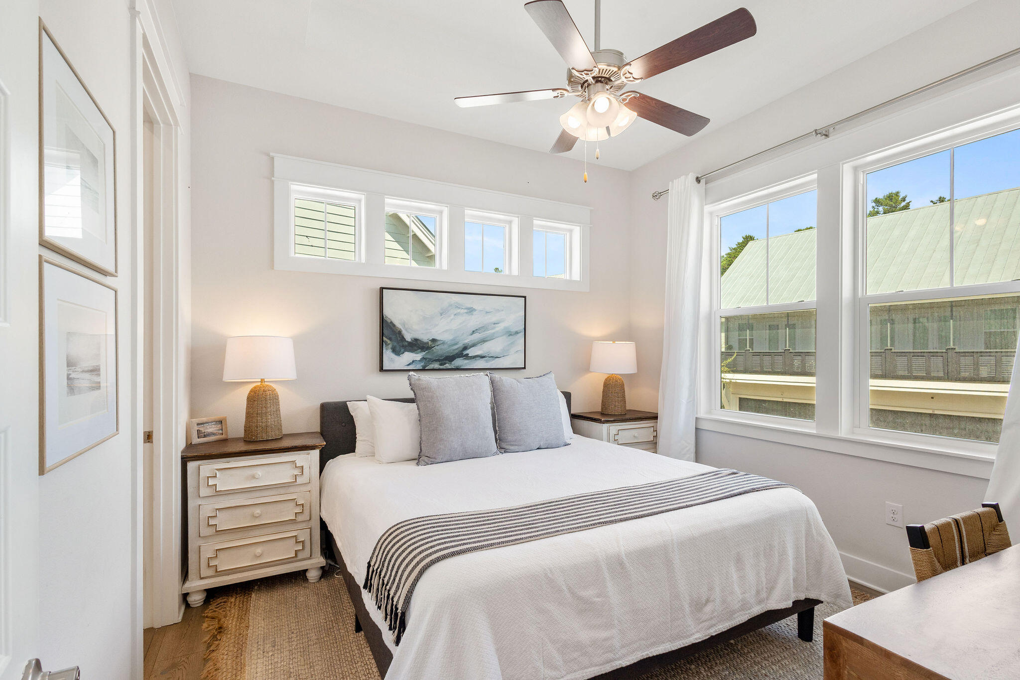 296 Milestone Dr Inlet Beach, Unit C Inlet Beach, FL 32461 - Photo 22 of 51 a bedroom with a large bed and a window