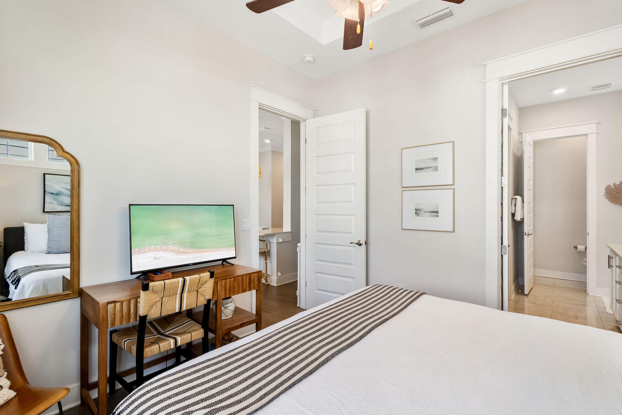 296 Milestone Dr Inlet Beach, Unit C Inlet Beach, FL 32461 - Photo 23 of 51 a bedroom with furniture and a window